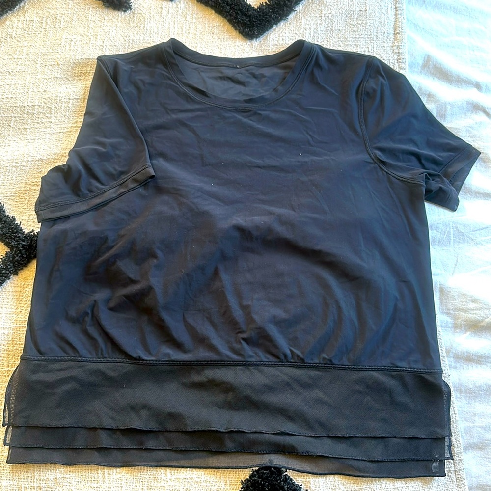 Lululemon sheer ruffle hem tshirt size 4